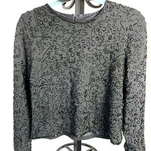 Ralph Lauren cropped top. Embroidered sequins. Zipper sleeves. Zipper back.